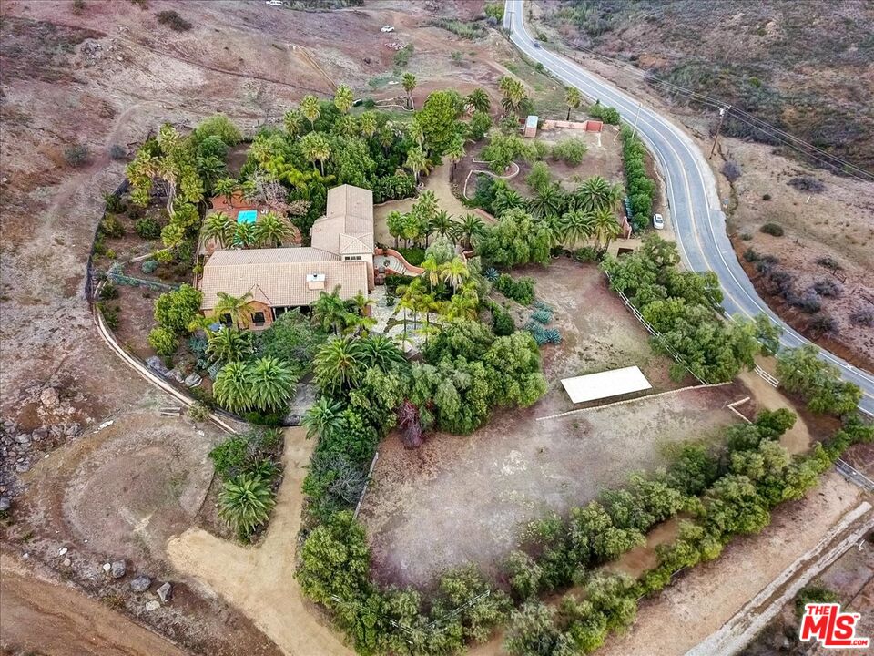 1351 Decker Road Malibu, CA 90265 - Photo 25 of 54 a view of a garden with a pathway