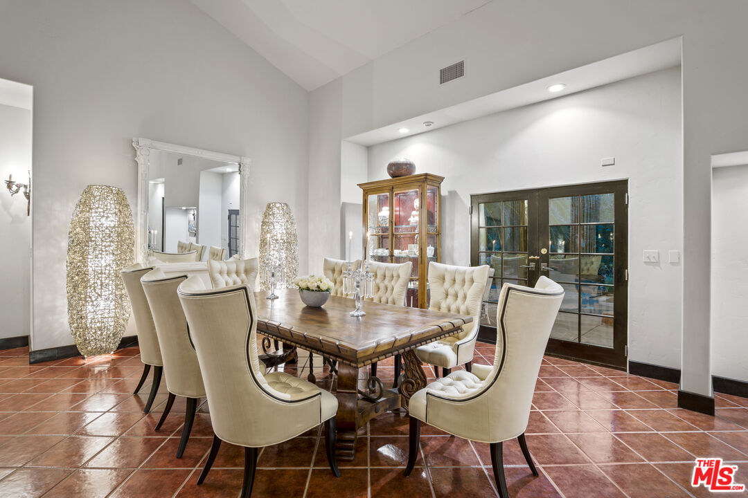 1351 Decker Road Malibu, CA 90265 - Photo 31 of 54 a view of a dining room with furniture and wooden floor