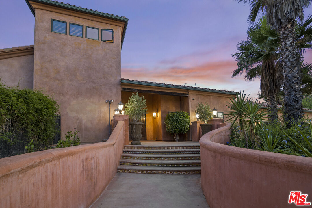 1351 Decker Road Malibu, CA 90265 - Photo 7 of 54 a view of a house with a patio