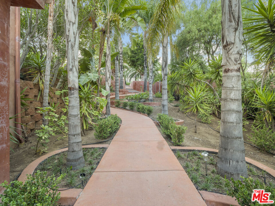 1351 Decker Road Malibu, CA 90265 - Photo 9 of 54 a view of a garden with pathway