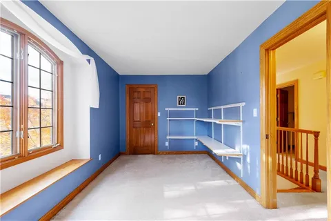 a bathroom with a double vanity sink mirror and shower