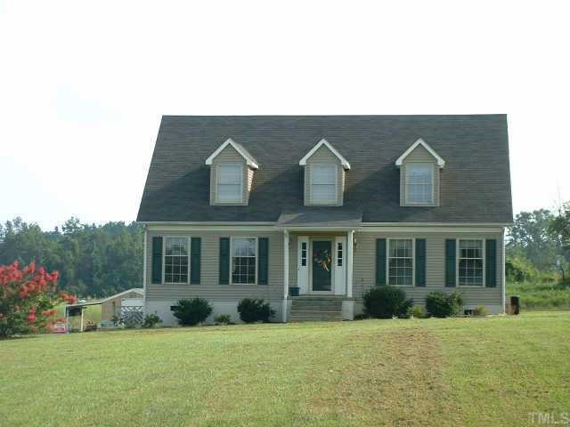 298 Noah Davis Road Roxboro, NC 27574 - Photo 1 of 1 a front view of a house with a yard