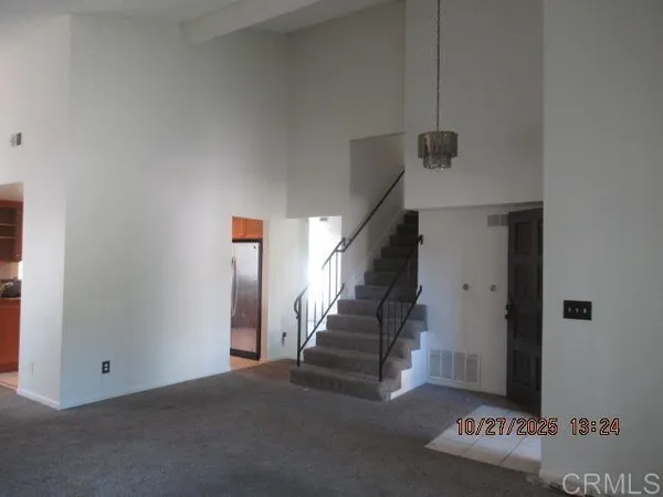 a view of an entryway with stairs