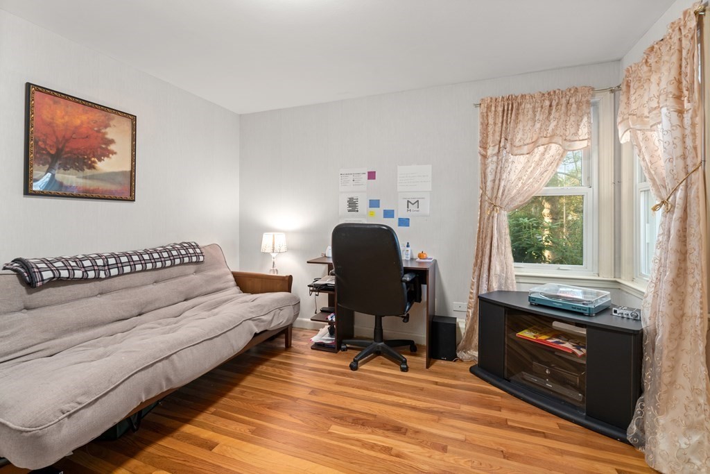 5 Myrtle Street Mendon, MA 01756 - Photo 11 of 22 a living room with furniture and a fireplace
