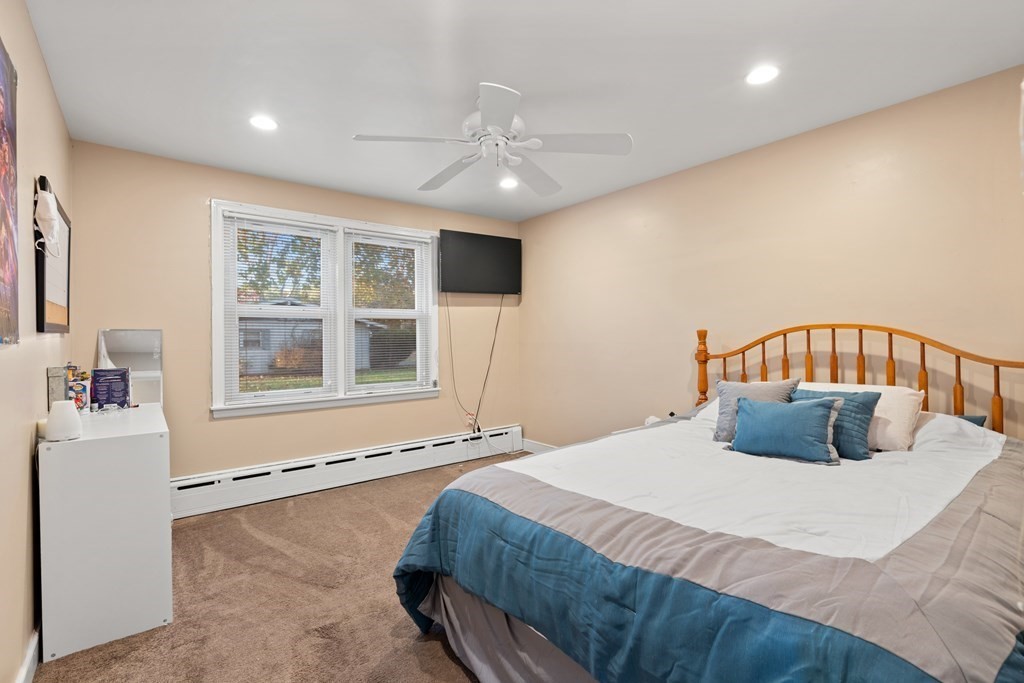 5 Myrtle Street Mendon, MA 01756 - Photo 13 of 22 a bedroom with a bed and window