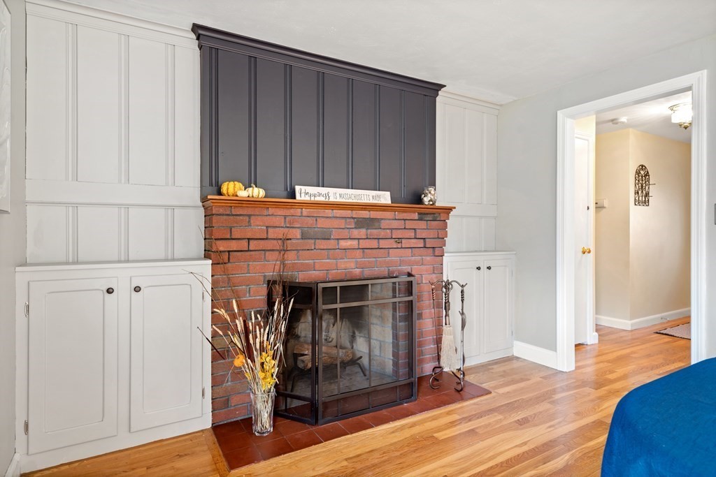 5 Myrtle Street Mendon, MA 01756 - Photo 9 of 22 a living room with a fireplace