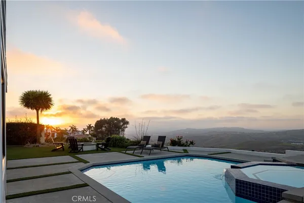 a view of a house with a swimming pool
