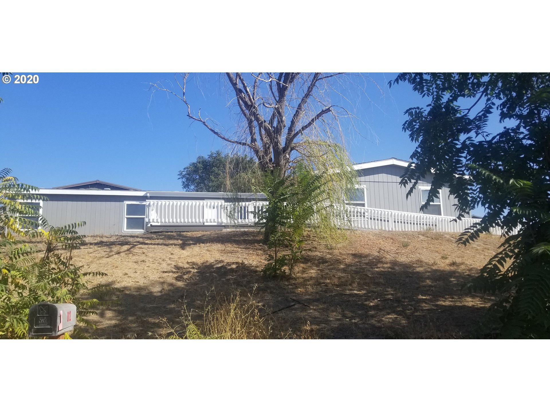 812 Southwest 12th Street Pendleton, OR 97801 - Photo 1 of 32 a view of a house with a yard
