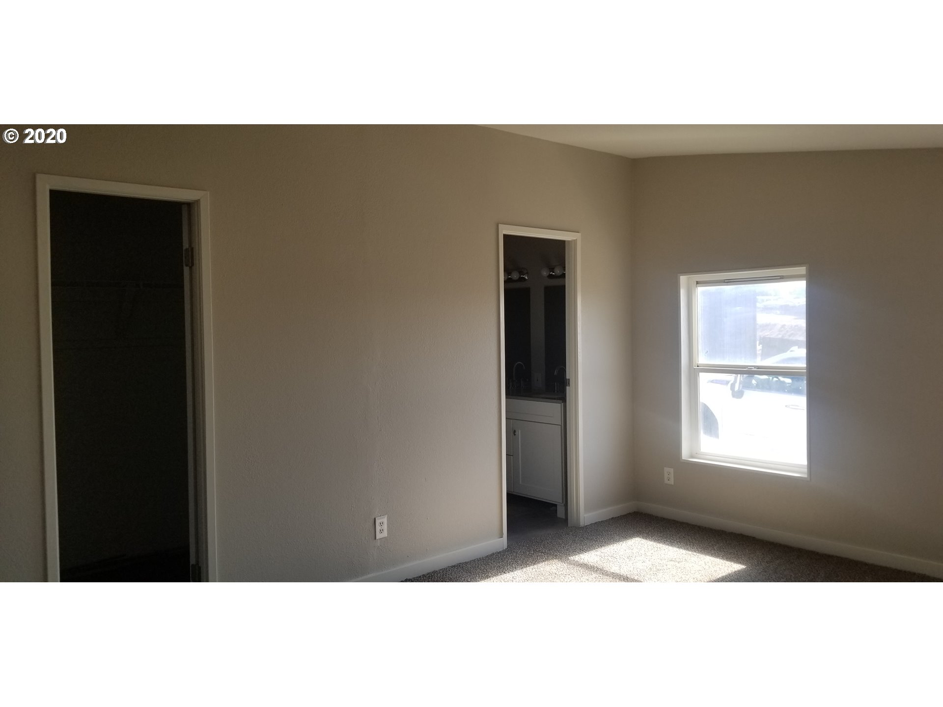 812 Southwest 12th Street Pendleton, OR 97801 - Photo 24 of 32 a view of an empty room with a window