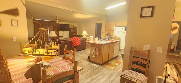 a view of a swimming pool with chairs