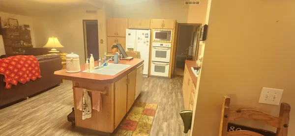 a en suite bathroom with a sink and mirror
