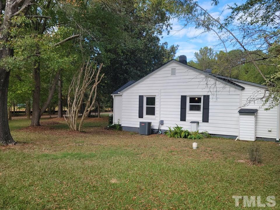 5524 Bobbitt Road Apex, NC 27539 - Photo 2 of 24 a view of a house with a yard