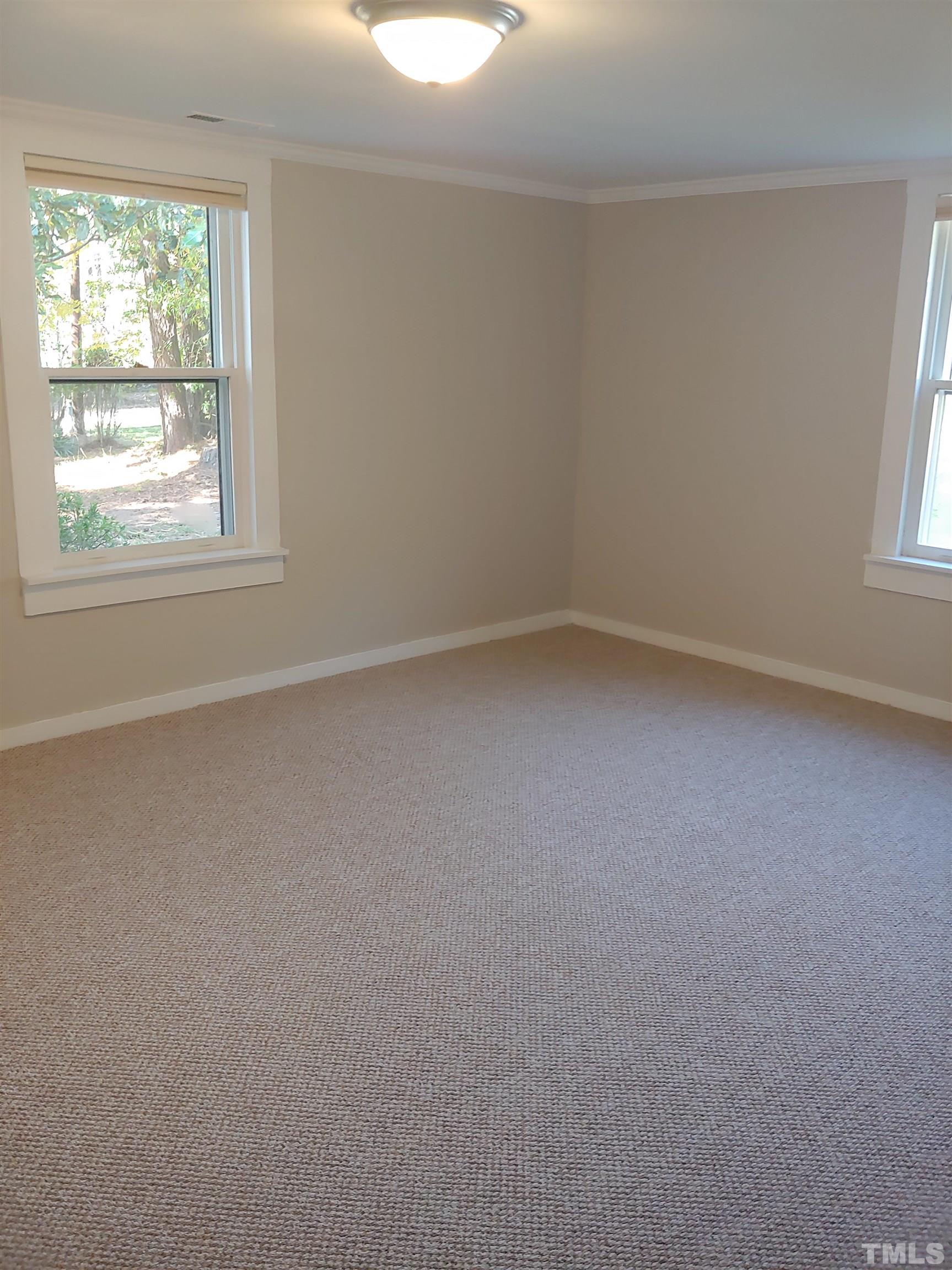 5524 Bobbitt Road Apex, NC 27539 - Photo 11 of 24 an empty room with a window