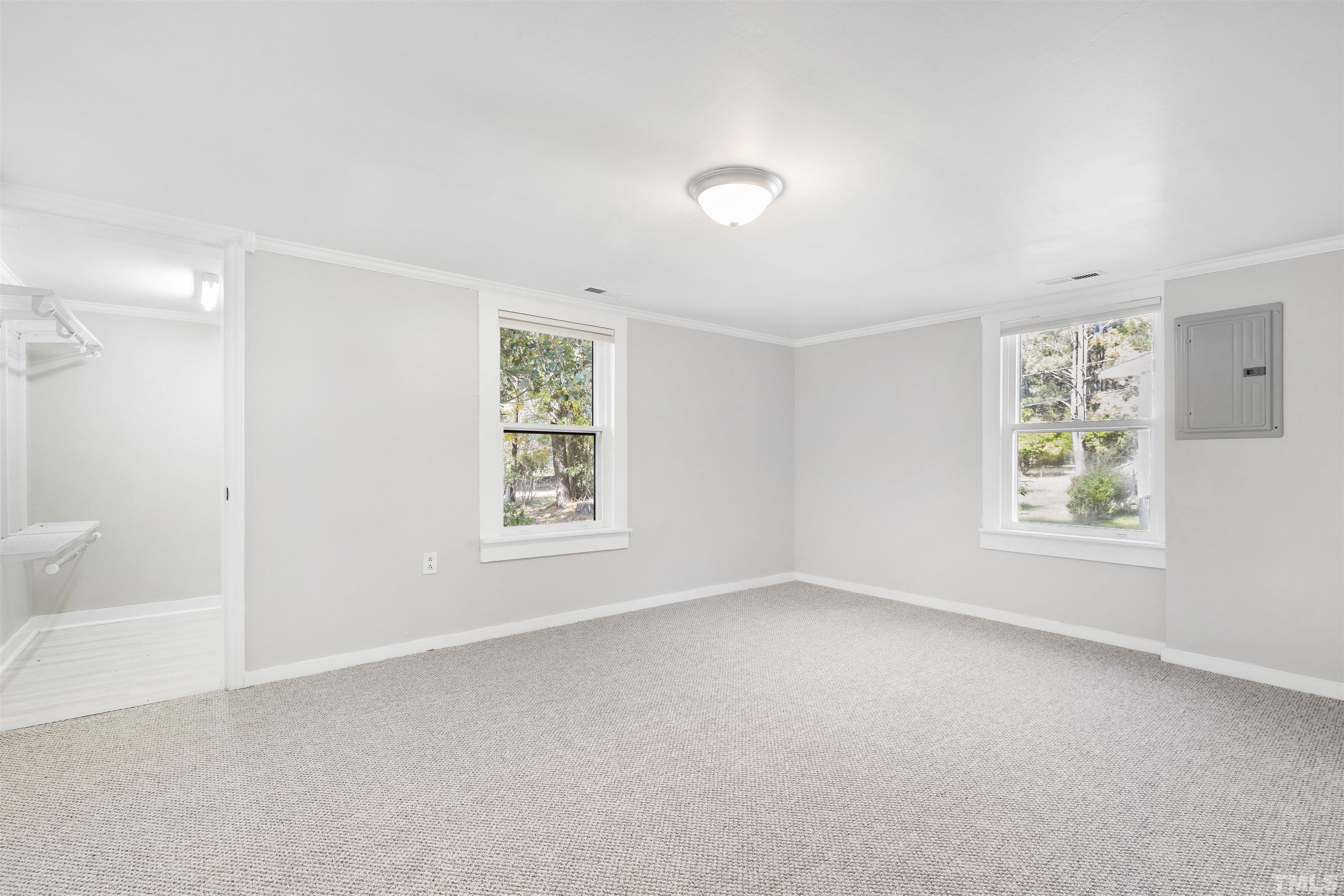 5524 Bobbitt Road Apex, NC 27539 - Photo 13 of 24 a view of an empty room with a window