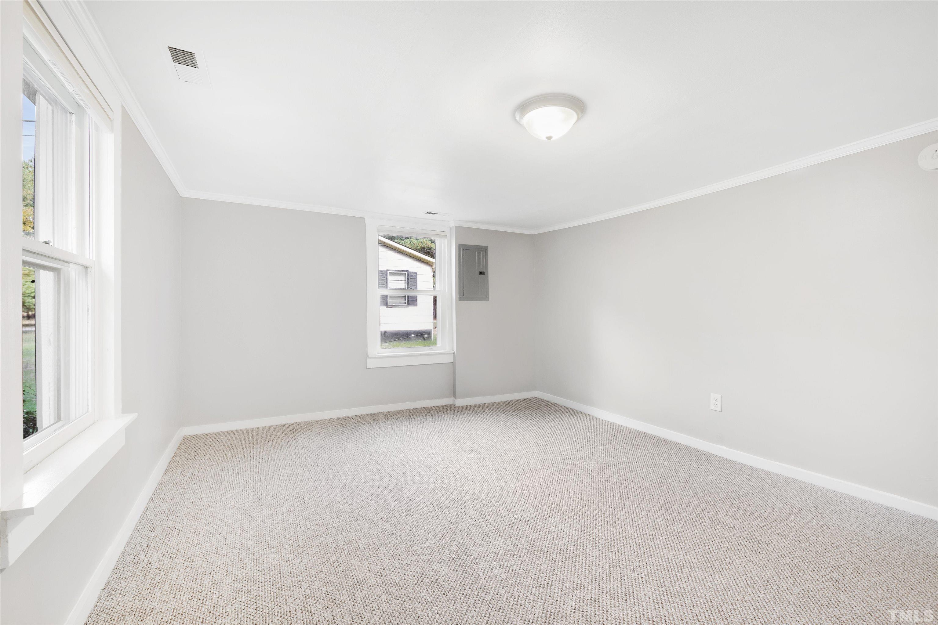 5524 Bobbitt Road Apex, NC 27539 - Photo 15 of 24 an empty room with windows