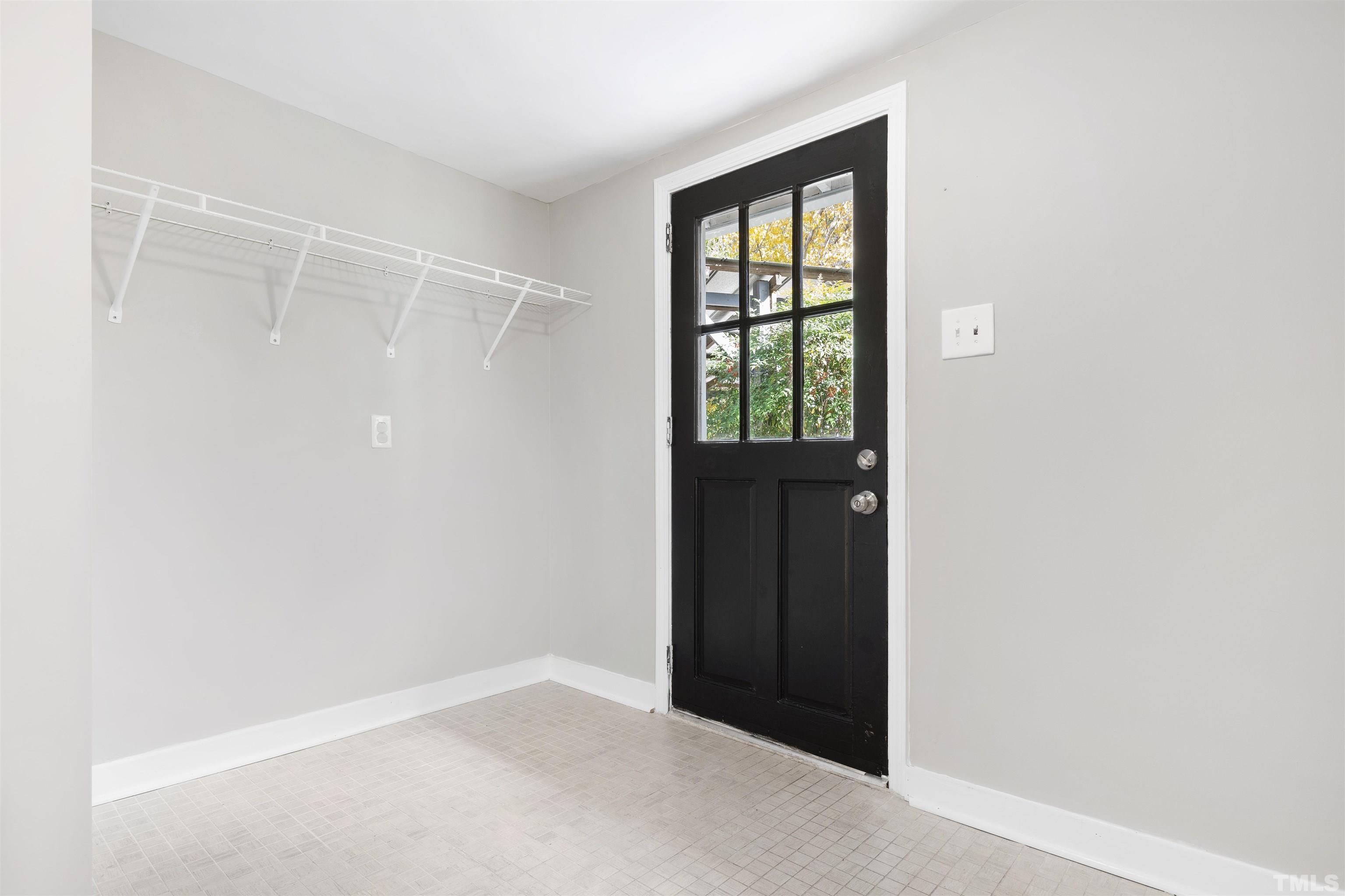 5524 Bobbitt Road Apex, NC 27539 - Photo 18 of 24 a view of an empty room with a window