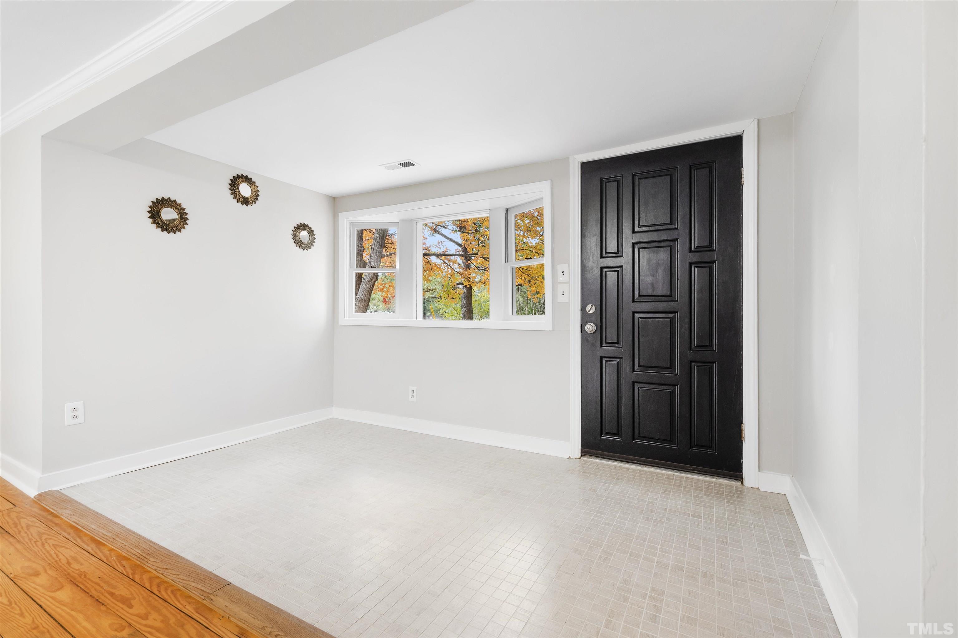 5524 Bobbitt Road Apex, NC 27539 - Photo 19 of 24 an empty room with windows