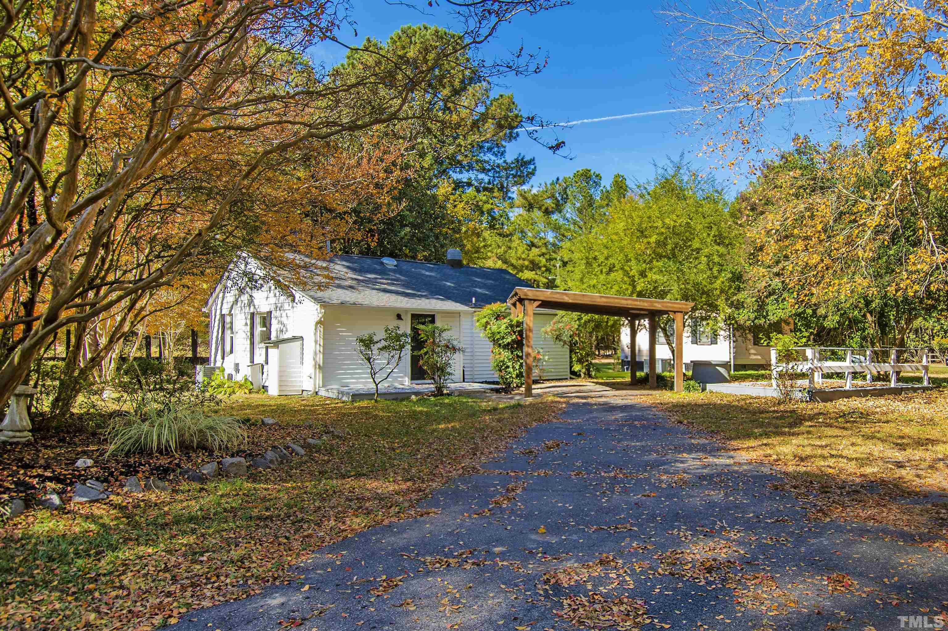 5524 Bobbitt Road Apex, NC 27539 - Photo 21 of 24 a front view of a house with a yard