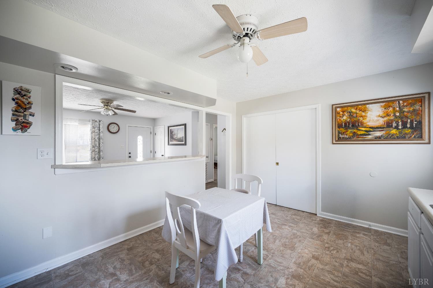 2050 Hawkins Mill Road Lynchburg, VA 24503 - Photo 11 of 32 a view of a livingroom with furniture and a chandelier fan