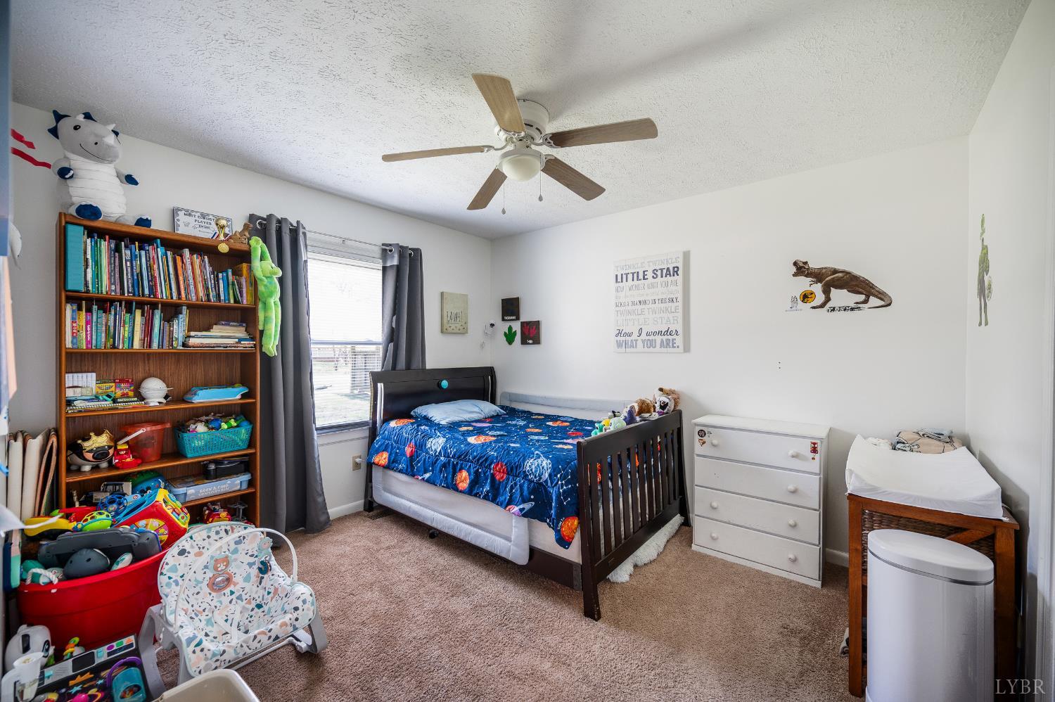 2050 Hawkins Mill Road Lynchburg, VA 24503 - Photo 16 of 32 a bedroom with a bed and wooden floor