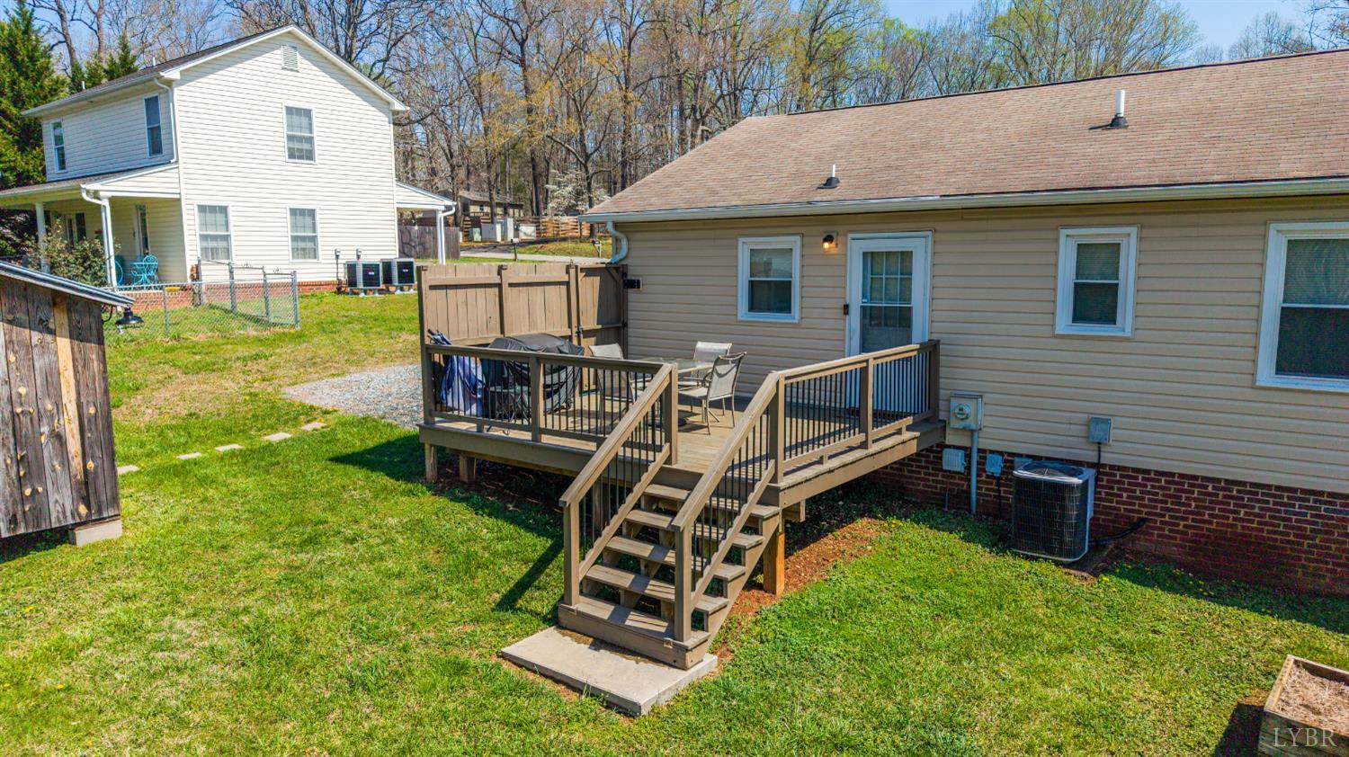 2050 Hawkins Mill Road Lynchburg, VA 24503 - Photo 24 of 32 a view of a house with backyard