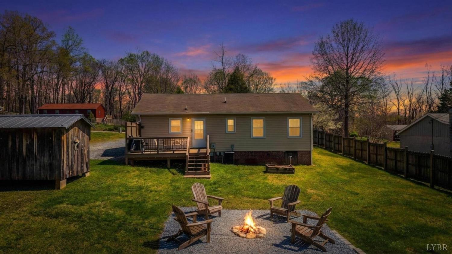 2050 Hawkins Mill Road Lynchburg, VA 24503 - Photo 32 of 32 a view of a house with backyard and sitting area