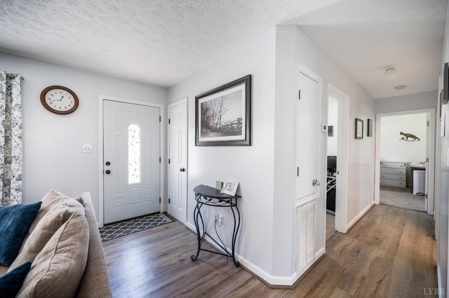 2050 Hawkins Mill Road Lynchburg, VA 24503 - Photo 5 of 32 a view of a livingroom with furniture and wooden floor