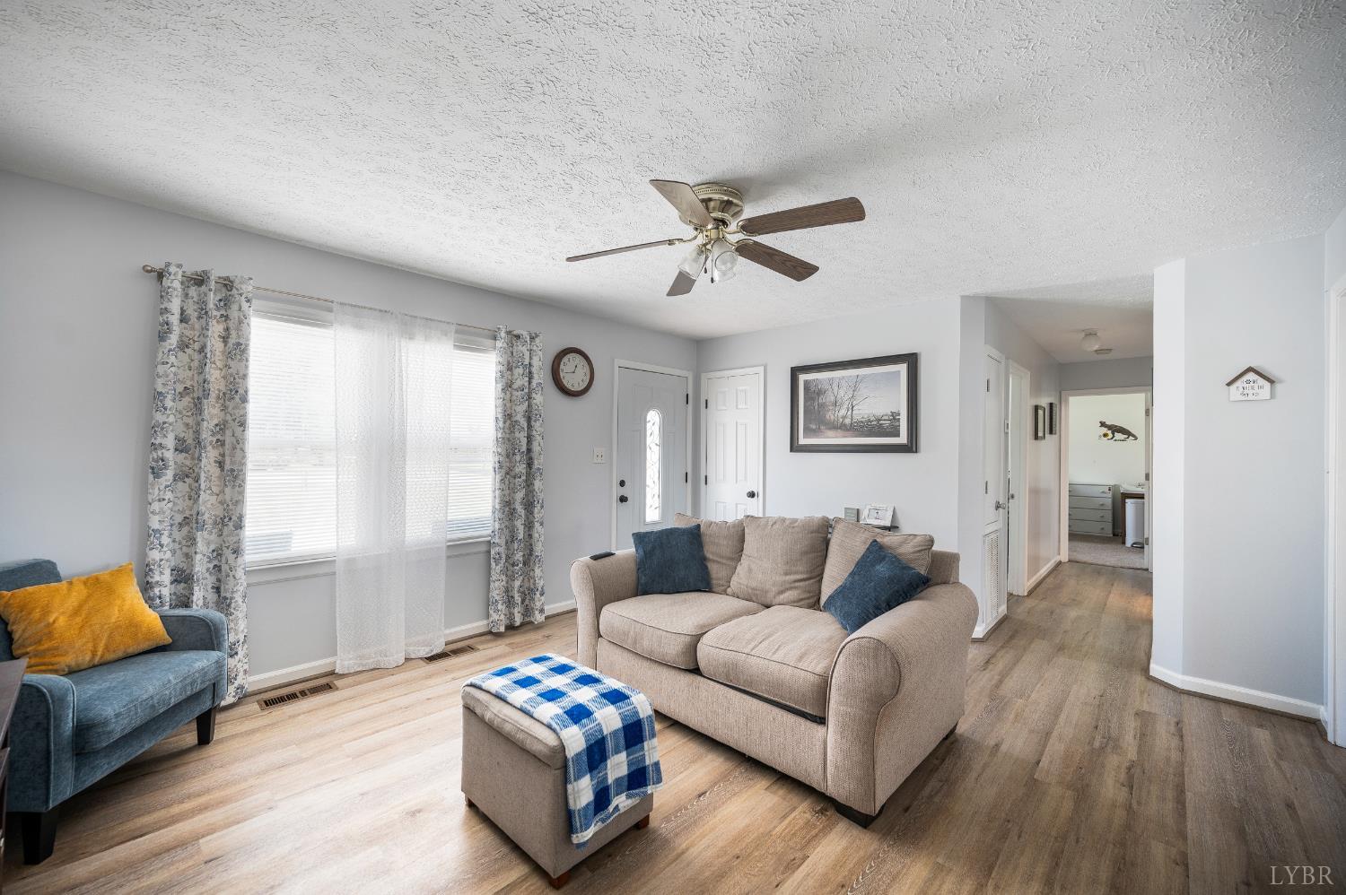 2050 Hawkins Mill Road Lynchburg, VA 24503 - Photo 7 of 32 a living room with furniture and a window