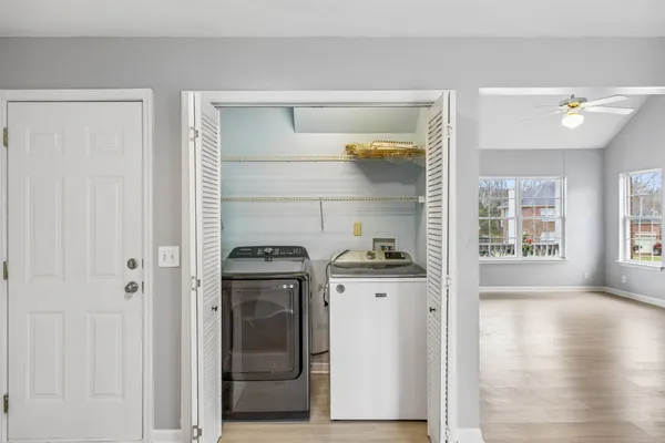 a kitchen with stainless steel appliances granite countertop a stove and a refrigerator