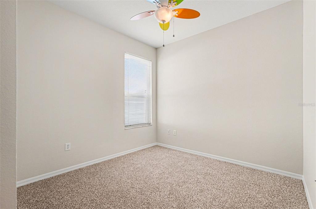 30631 Nickerson Loop Wesley Chapel, FL 33543 - Photo 25 of 33 an empty room with a window