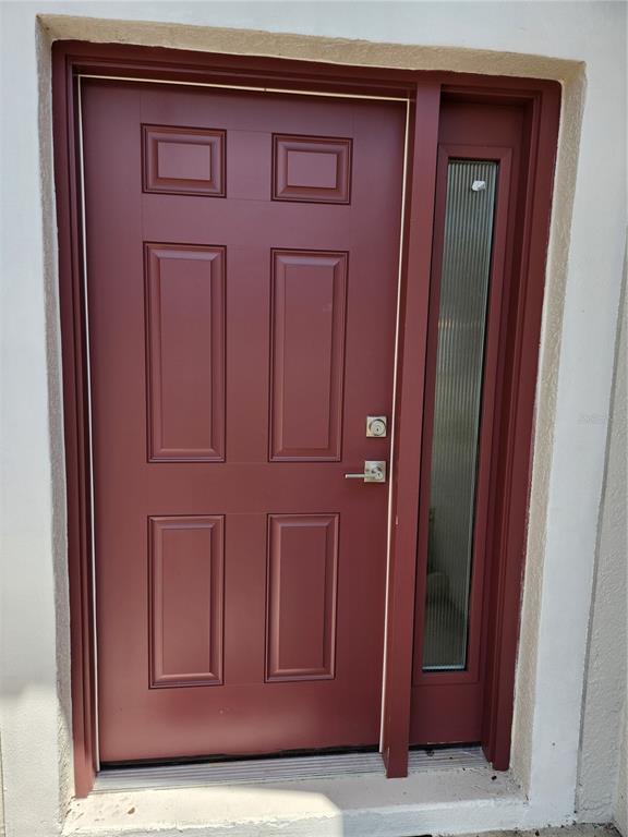 30631 Nickerson Loop Wesley Chapel, FL 33543 - Photo 6 of 33 a view of front door