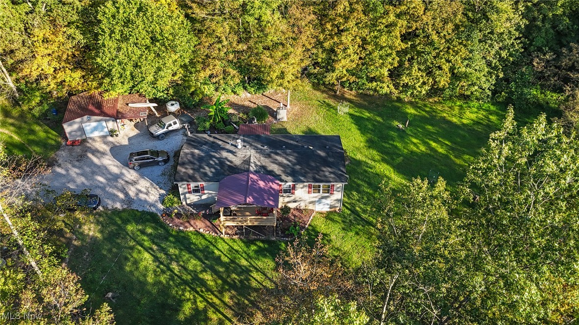 1788 Rosenbush Road Newport, OH 45768 - Photo 33 of 34 Aerial view of property and surrounding area featuring a heavily wooded area