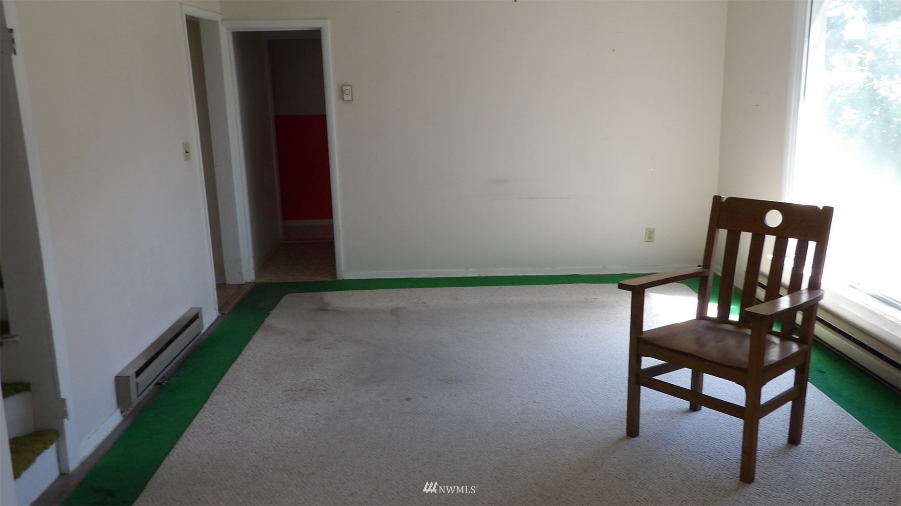 413 North Snyder Road Ritzville, WA 99169 - Photo 15 of 21 a view of room with a door and a chair