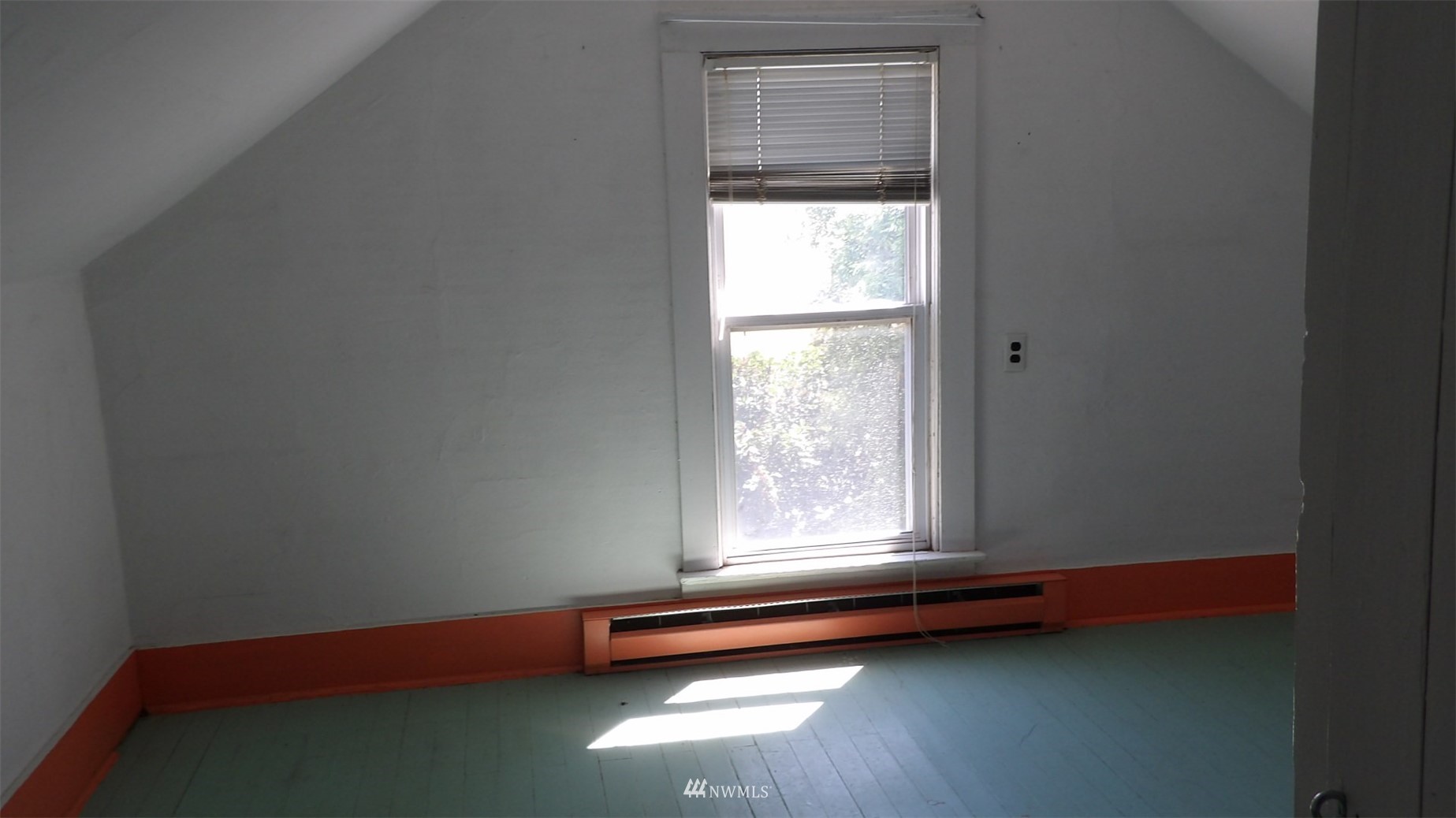 413 North Snyder Road Ritzville, WA 99169 - Photo 21 of 21 a view of a room with wooden floor and a window