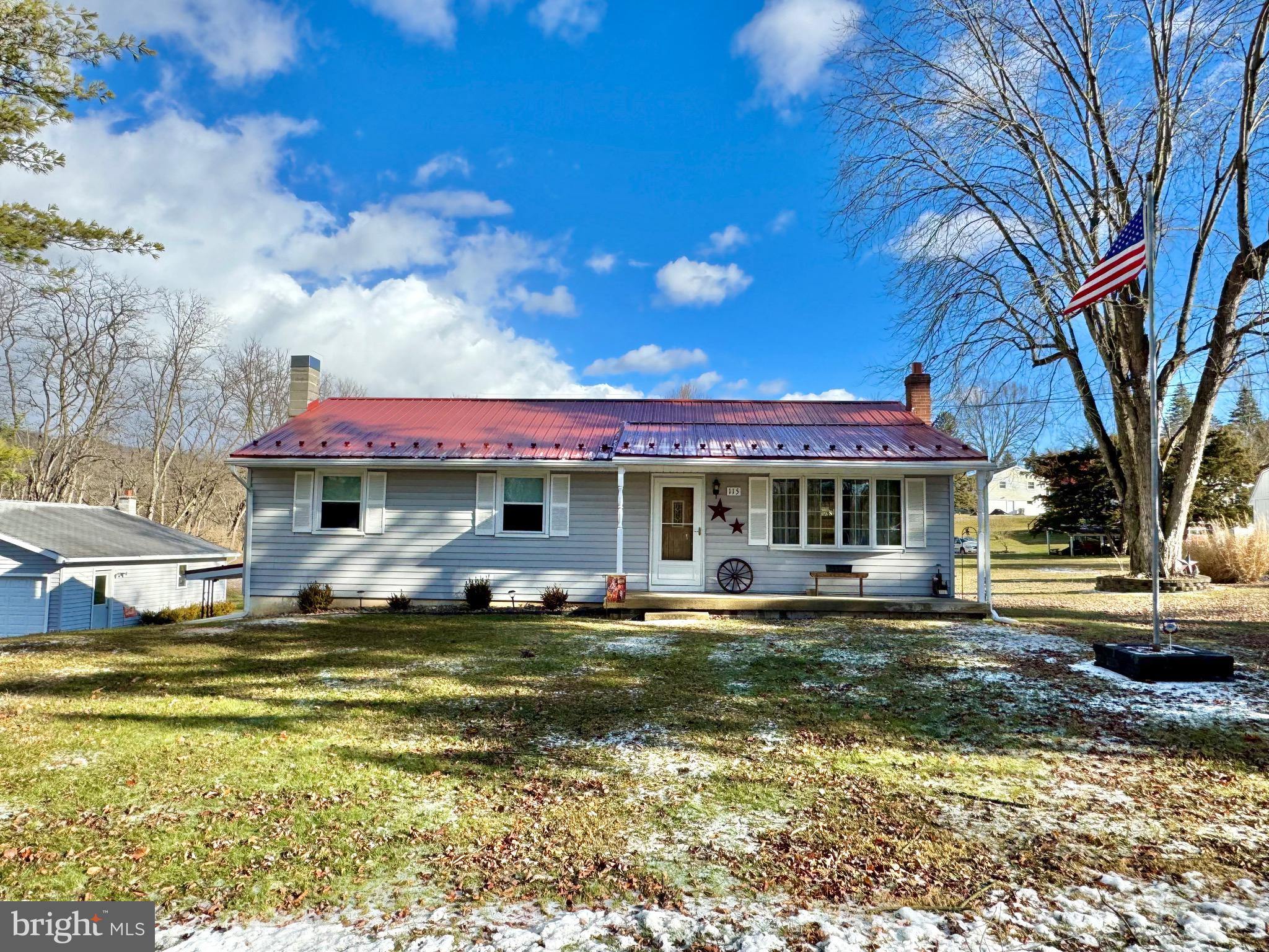 115 Upper Gyp Road Bellefonte, PA 16823 - Photo 1 of 27 a view of a house with swimming pool and sitting area