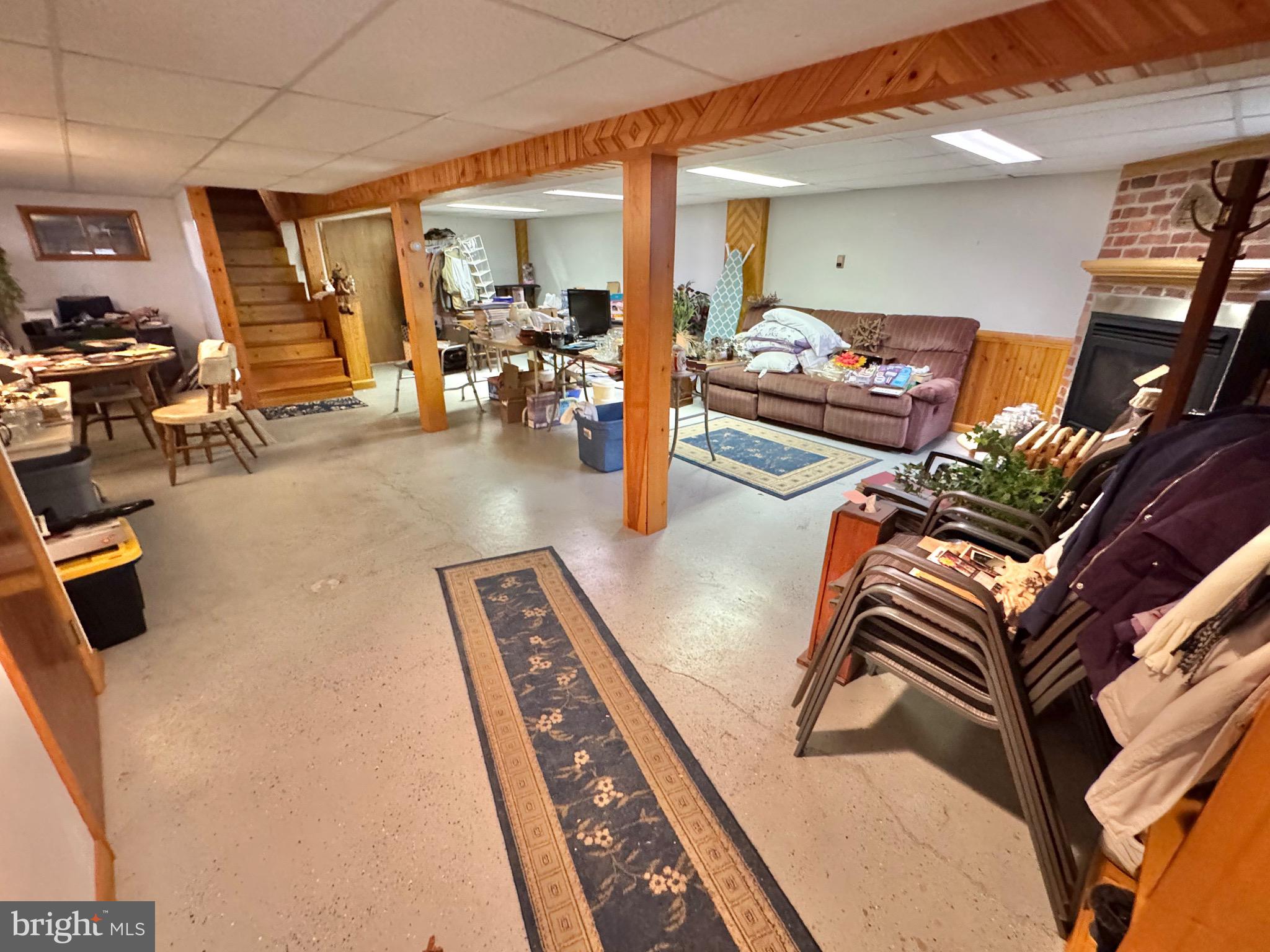 115 Upper Gyp Road Bellefonte, PA 16823 - Photo 15 of 27 a living room with furniture and a flat screen tv