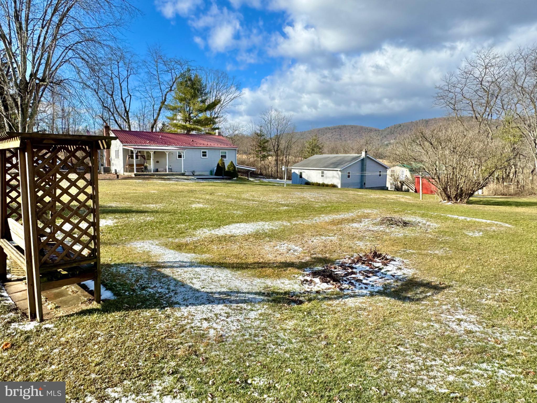 115 Upper Gyp Road Bellefonte, PA 16823 - Photo 21 of 27 a view of an swimming pool with an outdoor space