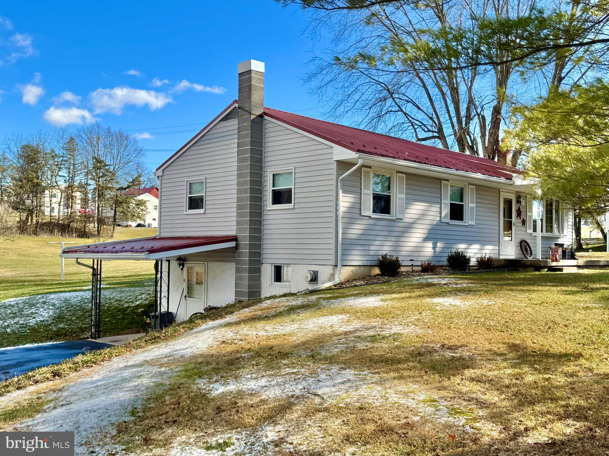 115 Upper Gyp Road Bellefonte, PA 16823 - Photo 27 of 27 a view of a house with a yard patio and fire pit