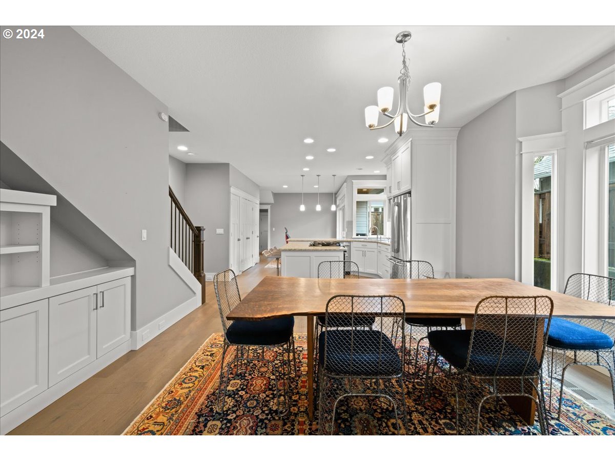 625 3rd Street Lake Oswego, OR 97034 - Photo 14 of 43 a view of a dining room with furniture and wooden floor