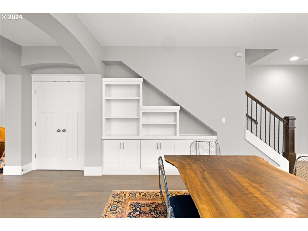 625 3rd Street Lake Oswego, OR 97034 - Photo 16 of 43 a view of a hallway with wooden floor and staircase
