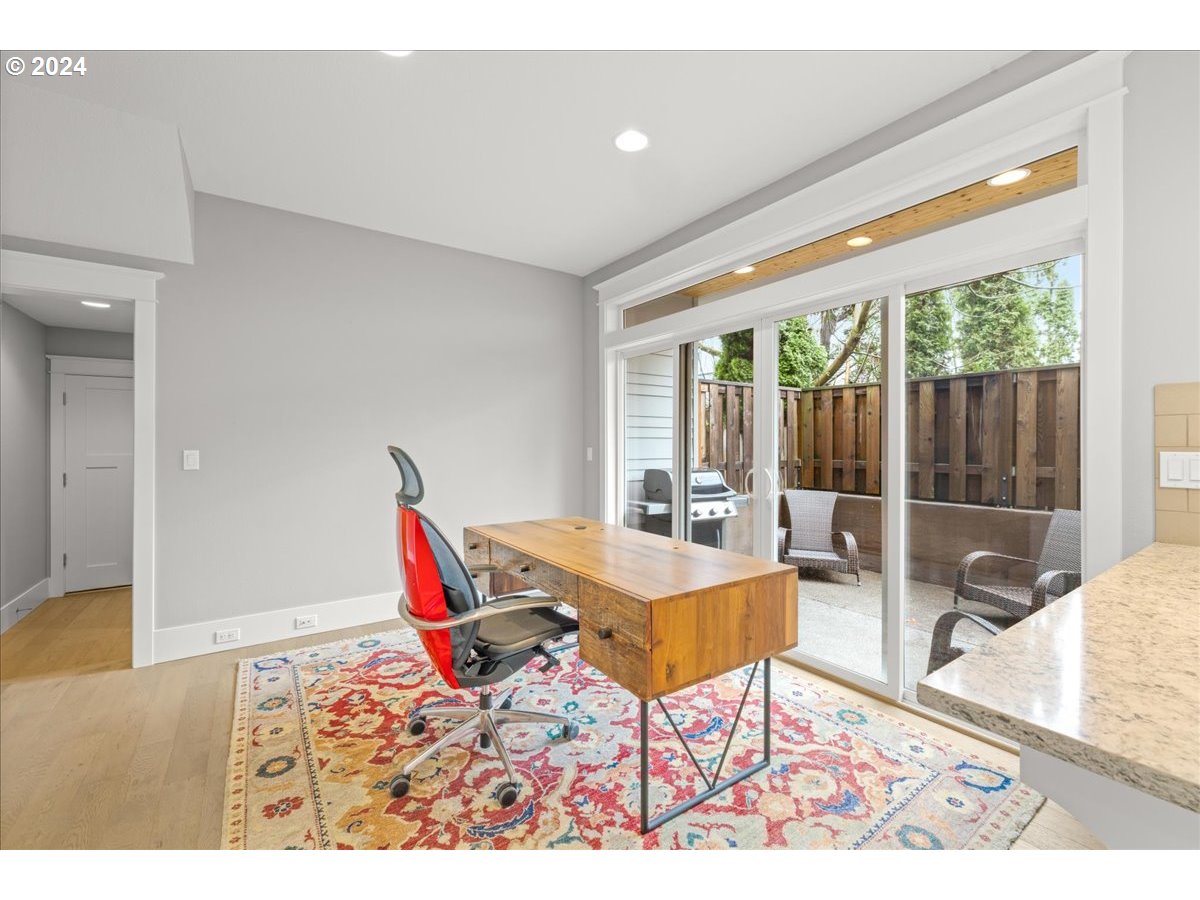 625 3rd Street Lake Oswego, OR 97034 - Photo 22 of 43 a living room with a rug and a table