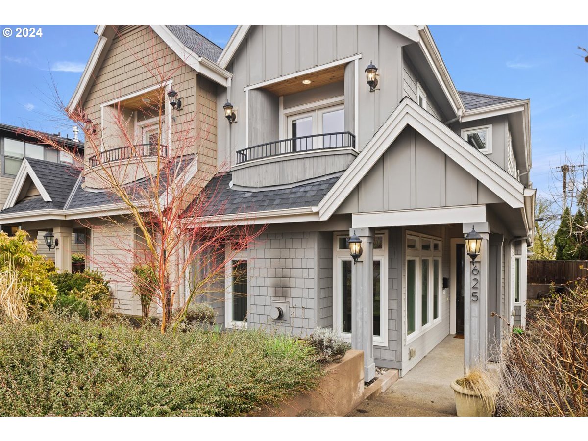 625 3rd Street Lake Oswego, OR 97034 - Photo 3 of 43 a view of a white house next to a yard