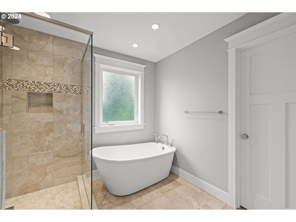 625 3rd Street Lake Oswego, OR 97034 - Photo 31 of 43 a bathroom with a bathtub and shower