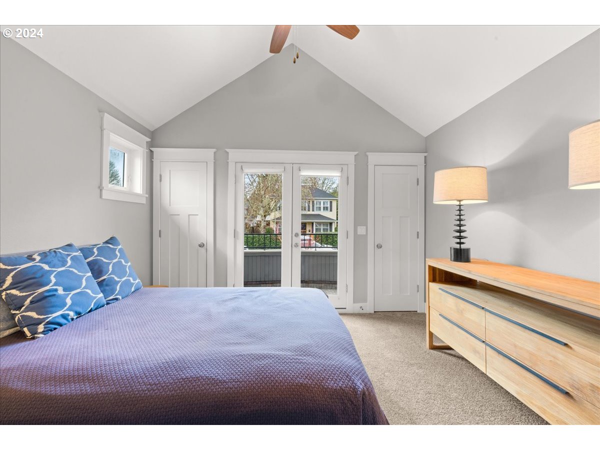 625 3rd Street Lake Oswego, OR 97034 - Photo 32 of 43 a bedroom with a large bed and dresser