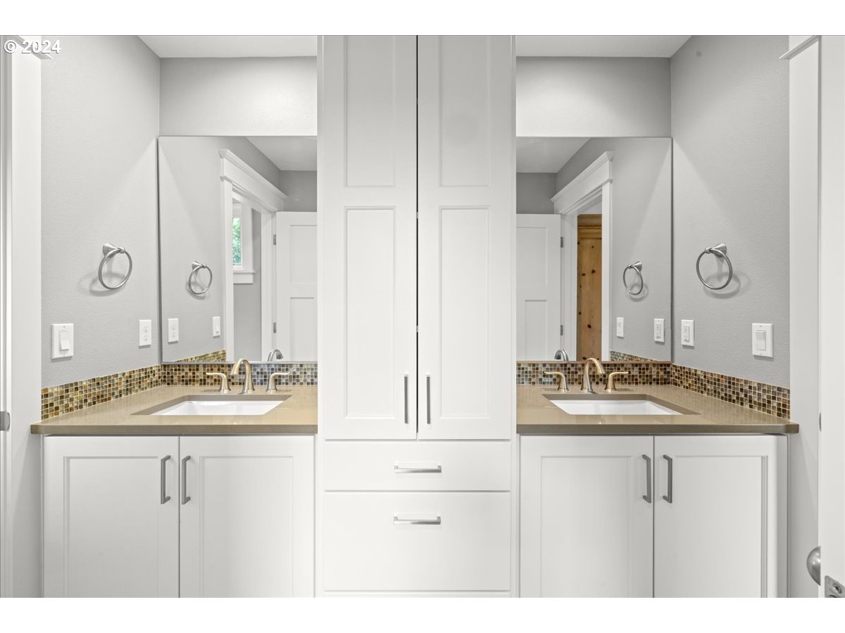 625 3rd Street Lake Oswego, OR 97034 - Photo 35 of 43 a bathroom with a sink and a mirror