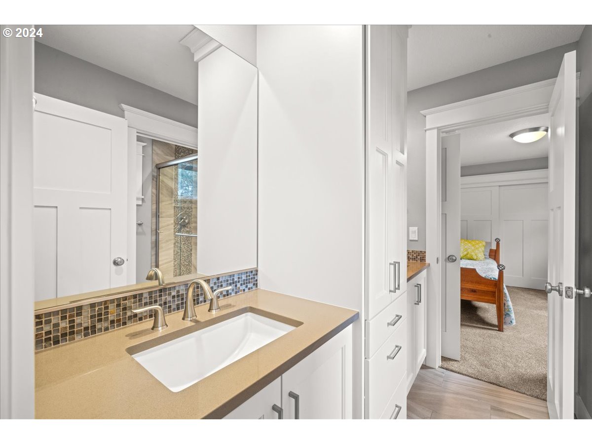 625 3rd Street Lake Oswego, OR 97034 - Photo 37 of 43 a bathroom with a sink and a mirror