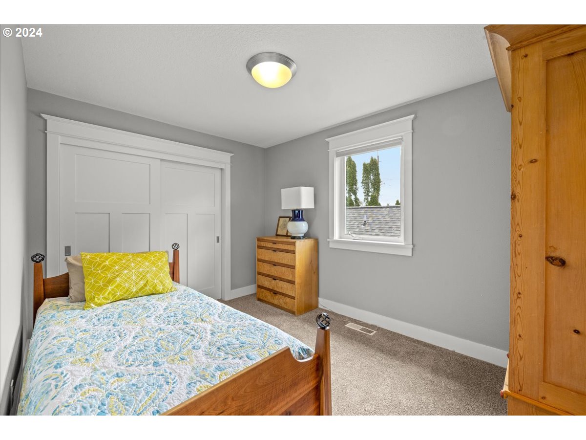 625 3rd Street Lake Oswego, OR 97034 - Photo 38 of 43 a bedroom with a bed and dresser