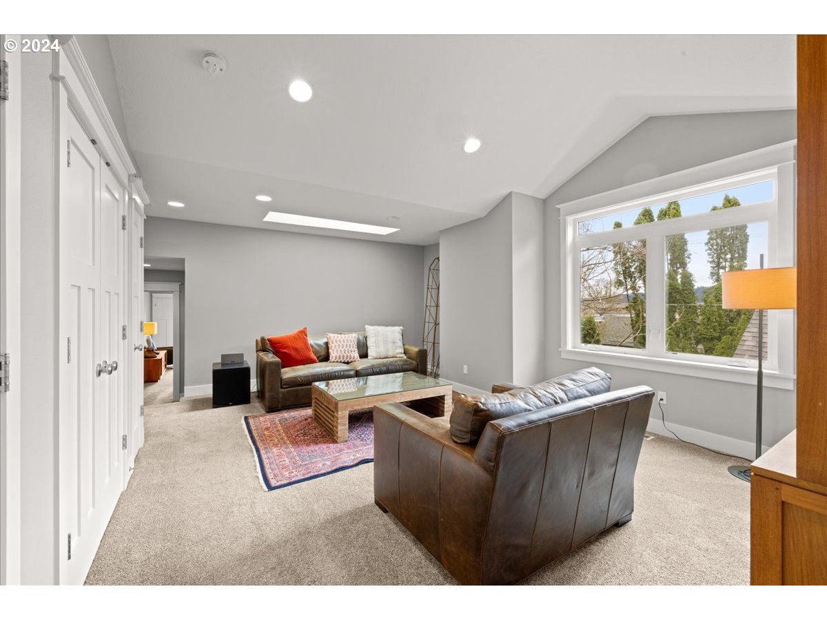 625 3rd Street Lake Oswego, OR 97034 - Photo 39 of 43 a living room with furniture and a large window
