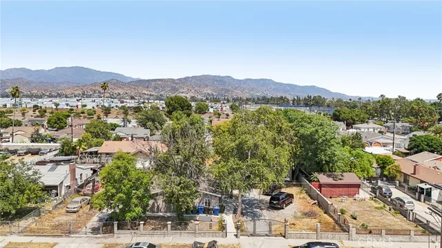 an aerial view of residential house with outdoor space