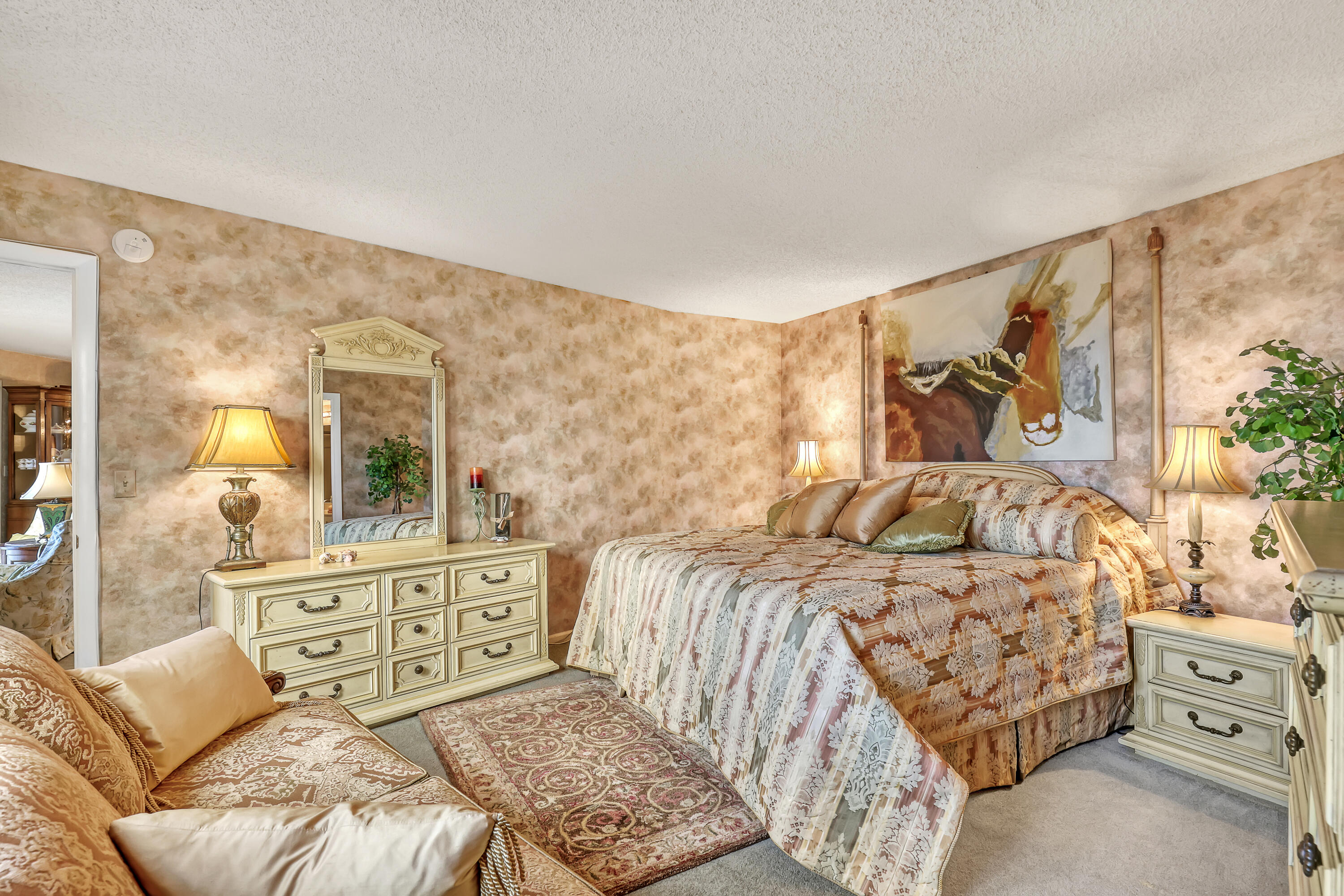 2800 North Ocean Drive, Unit A3C Singer Island, FL 33404 - Photo 13 of 28 a bedroom with a bed and a dresser